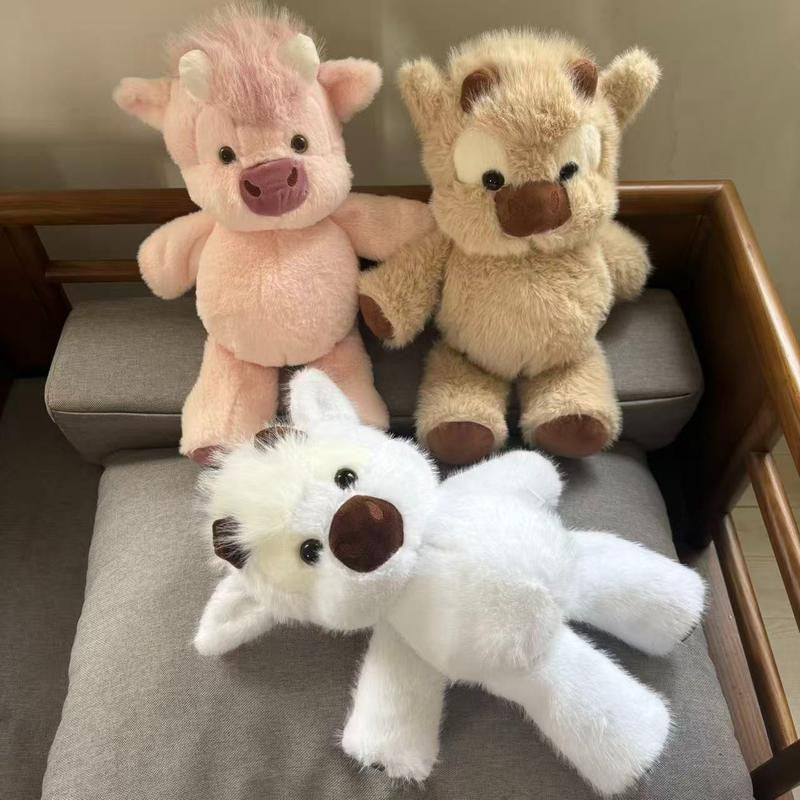 Clover the Highland Cow plush available in three colors: Highland Tan, Cloud Mist, Blossom Pink