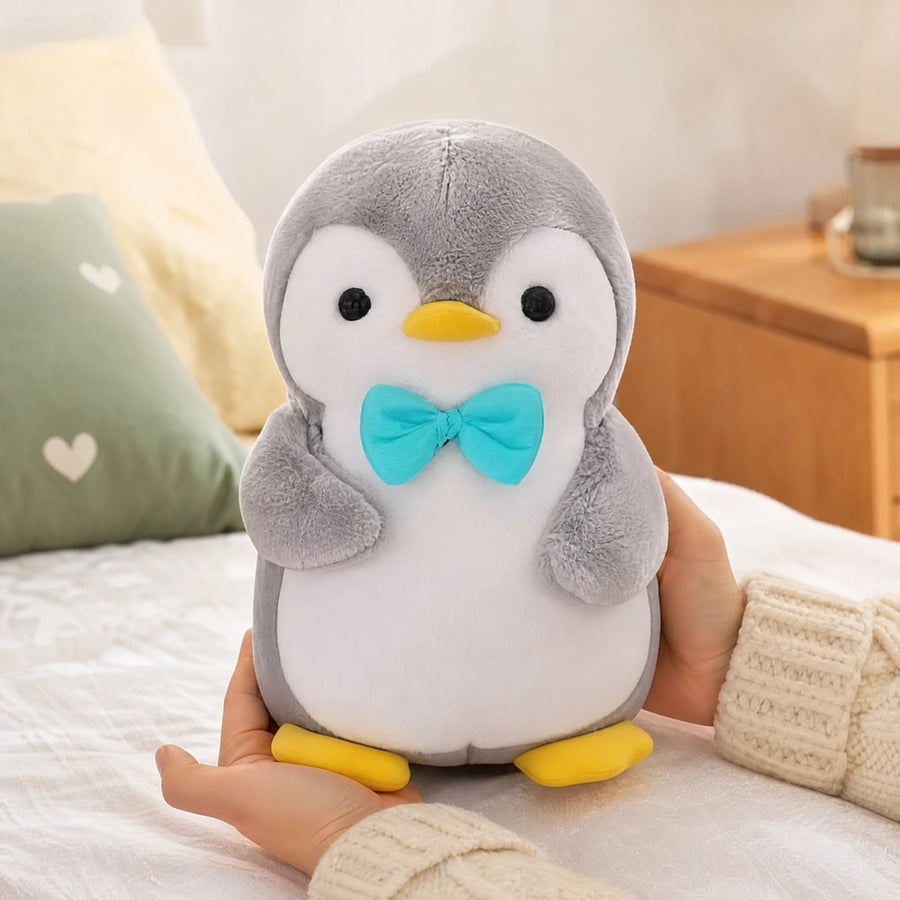 Penguin Plush with Bow Tie and Soft Gray Fabric - Utilisation du produit