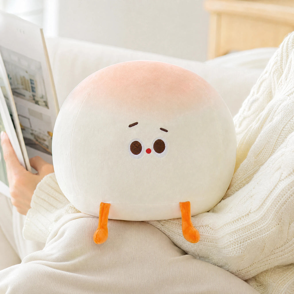 Bao Bun Plush with Embroidered Face and Orange Legs - Utilisation du produit