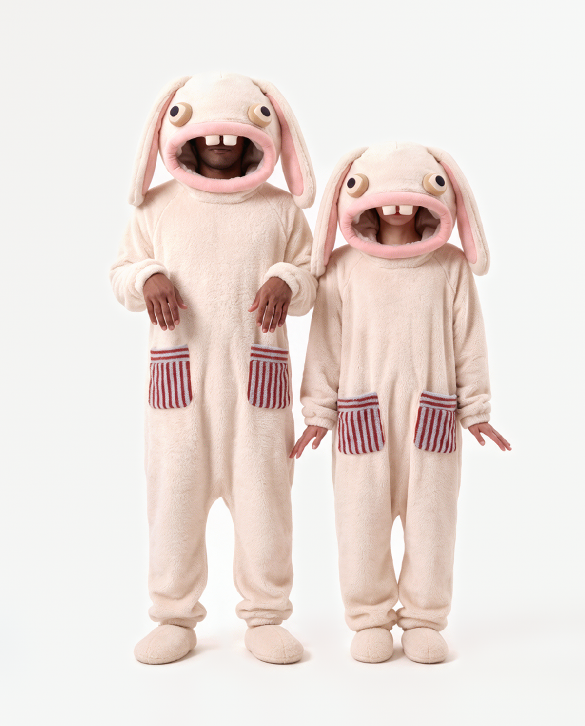 Marshmallow Bunny Onesie, two people in matching costumes hands