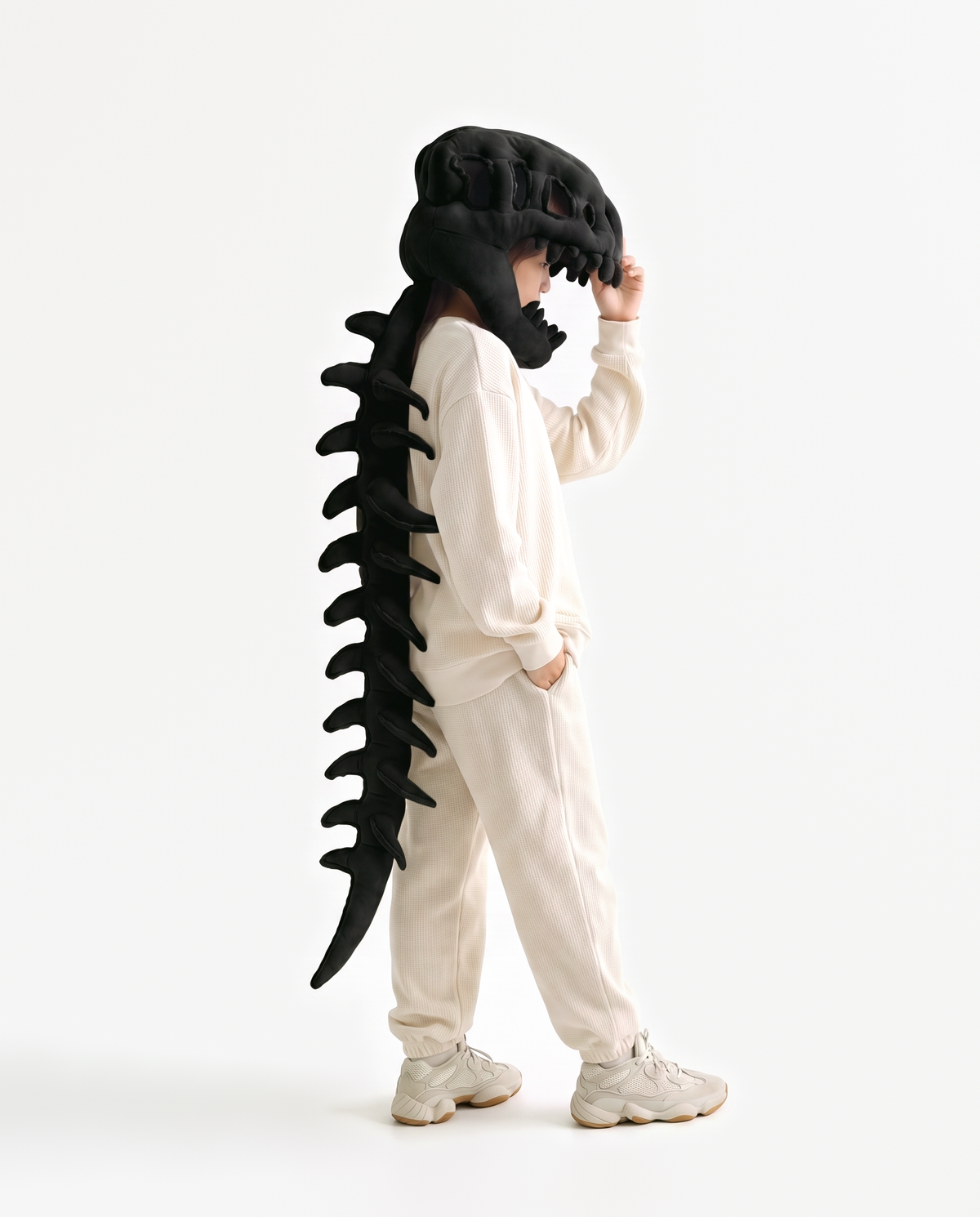 Black Dinosaur Skeleton Costume, side view hand on hood