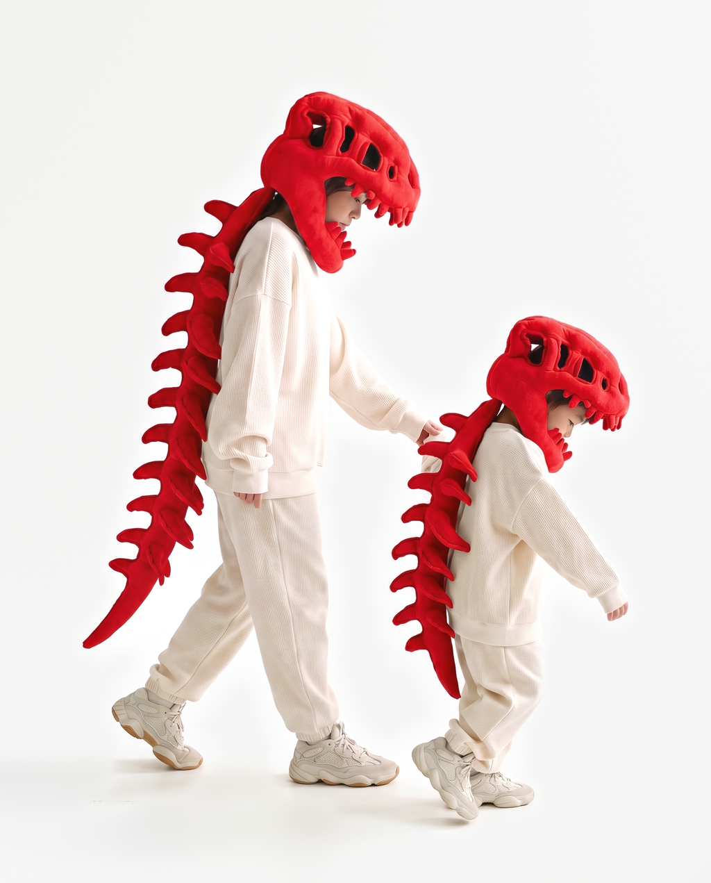 Red Dinosaur Skeleton Costume, two people in matching costumes walking