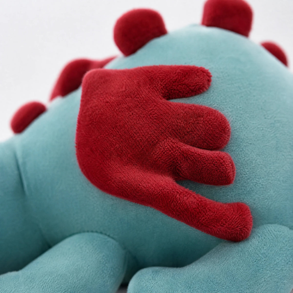 Dragon Plush Toy with Blue and Red Wings Design - Détail matière