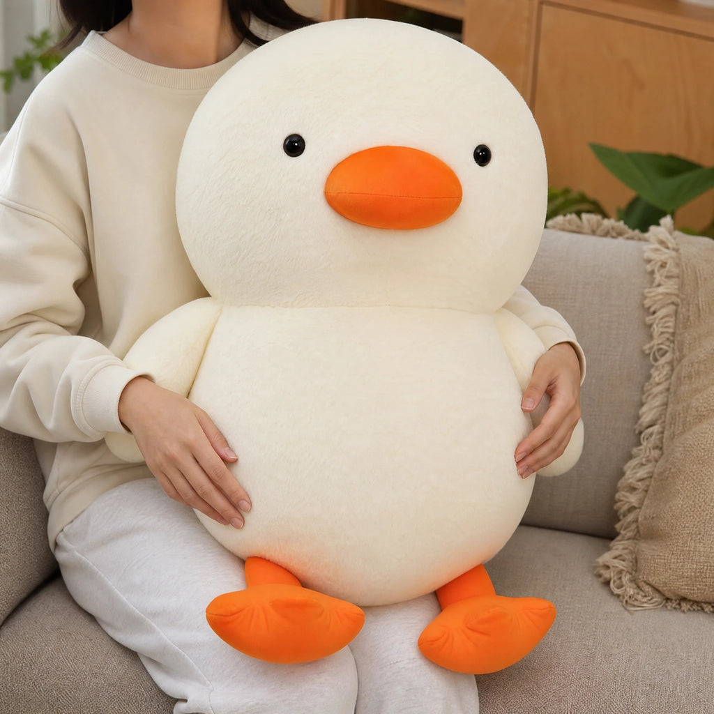 Duck Plush Toy with Round Body and Orange Beak - Utilisation du produit