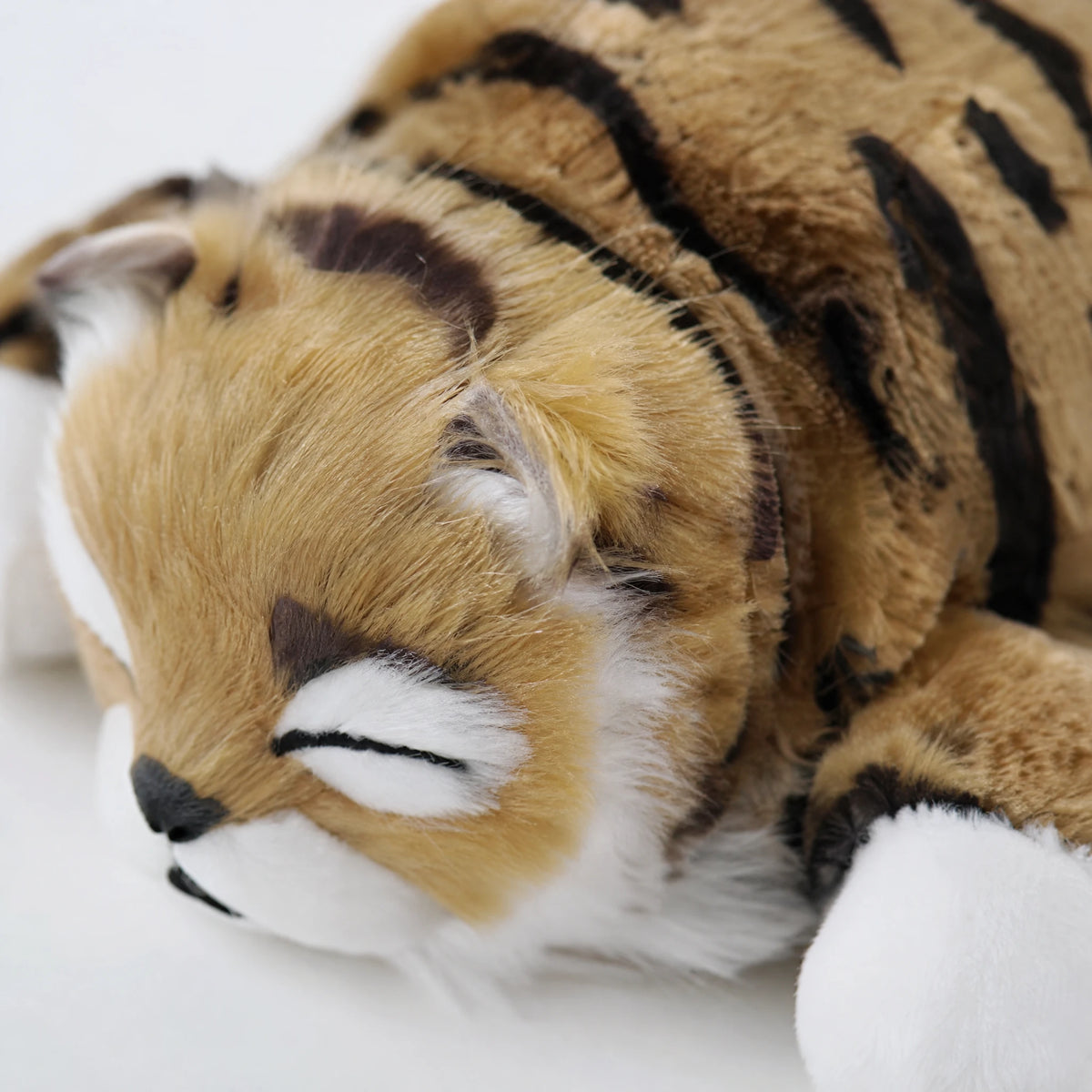 Interactive Cat Plush with Rolling Motion & Sound - Détail matière