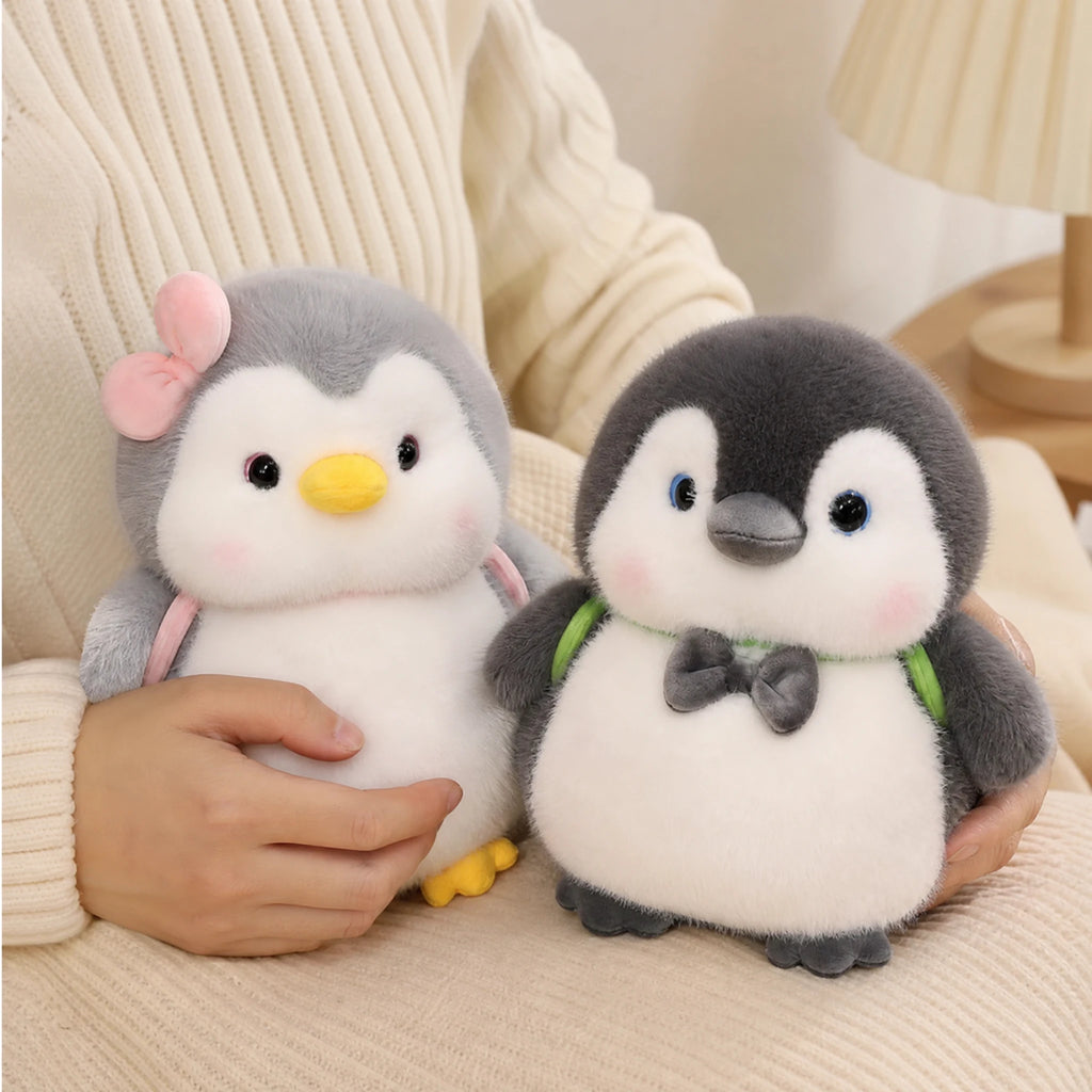 Penguin Plush with Pink Bow and Gray Backpack - Utilisation du produit