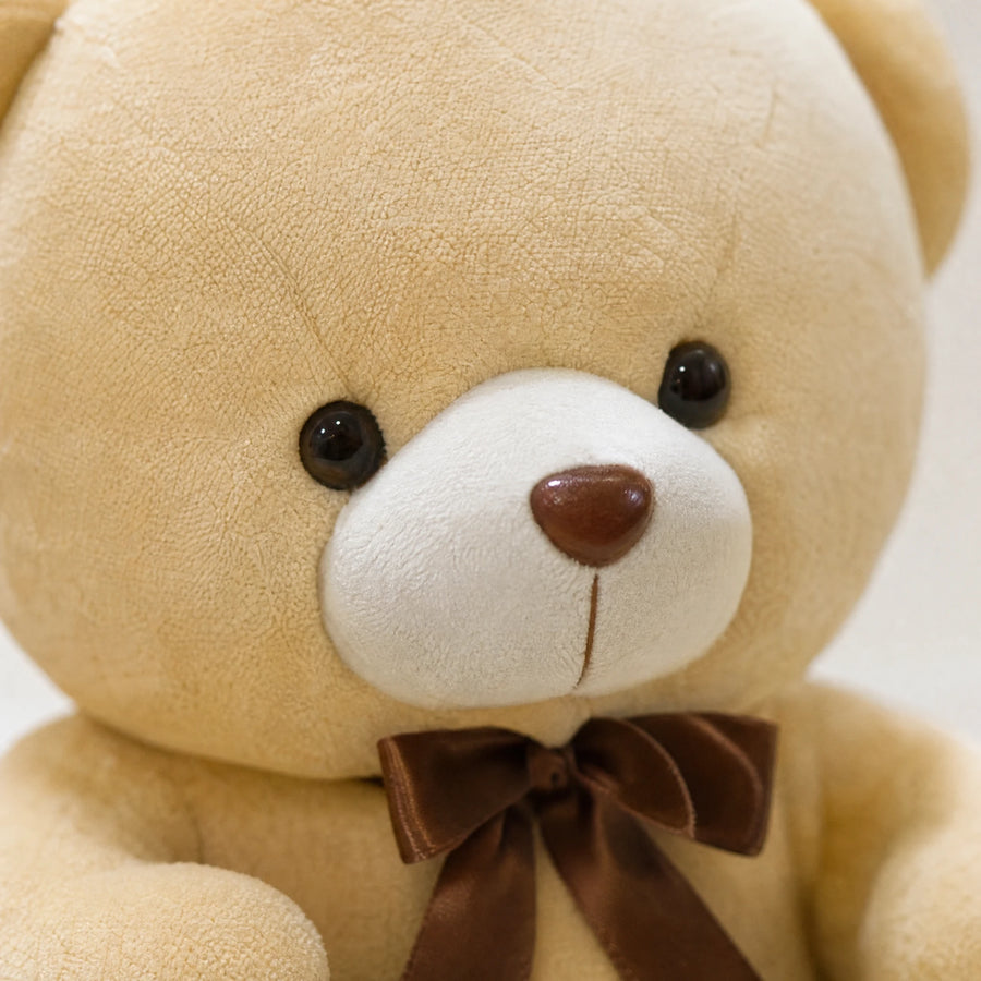 Teddy Bear Plush in Soft Beige with Brown Ribbon - Détail matière