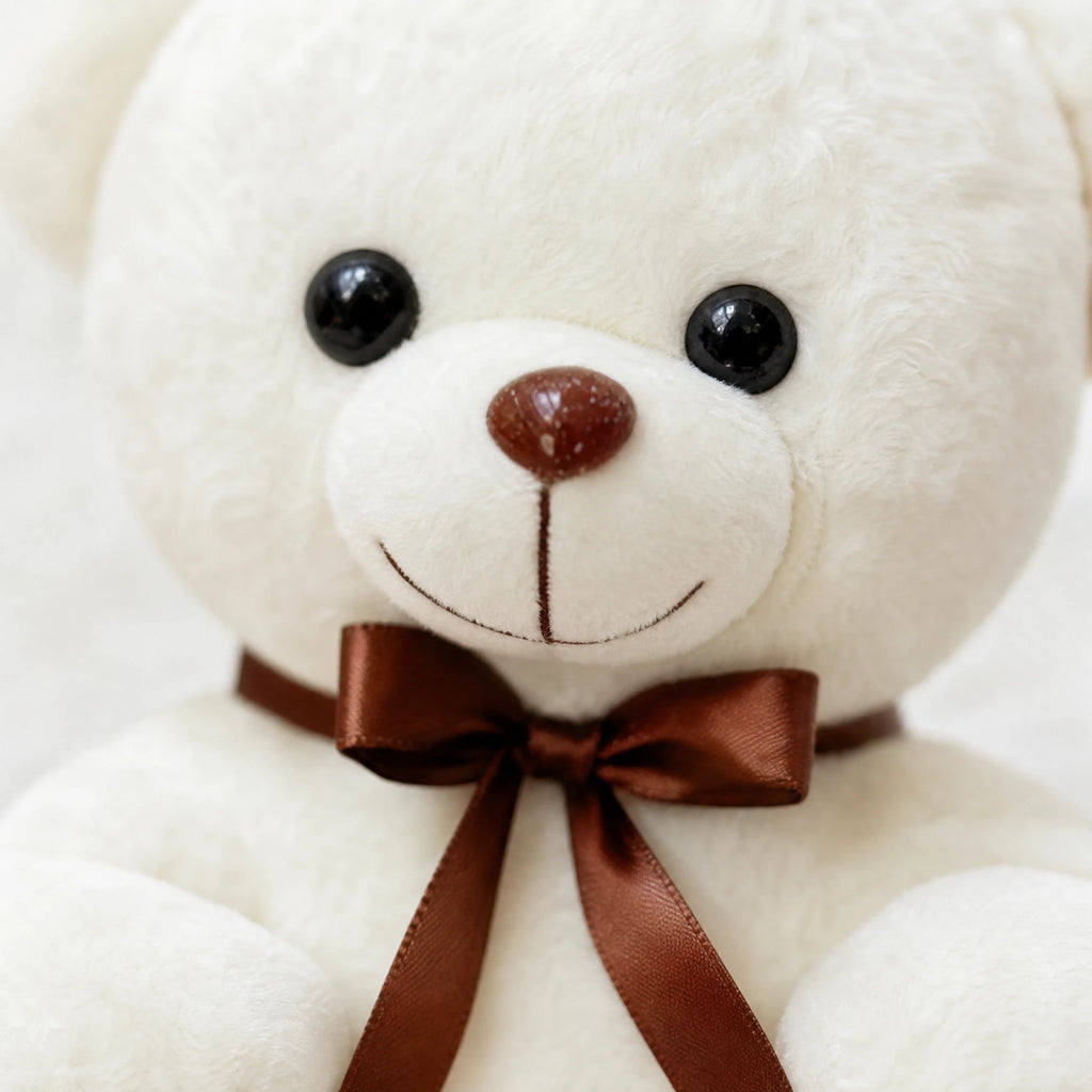 White Teddy Bear Plush with Brown Bow and Paw Prints - Détail matière